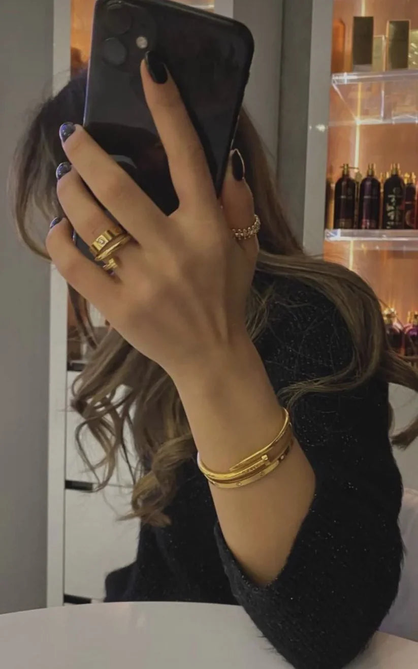 Nail & Cartier Bangle With Ring Stack