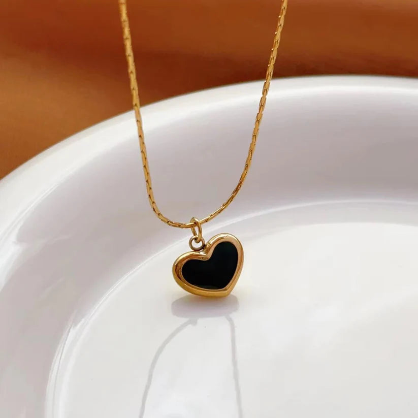 Black Heart Necklace With A Gold-toned Chain